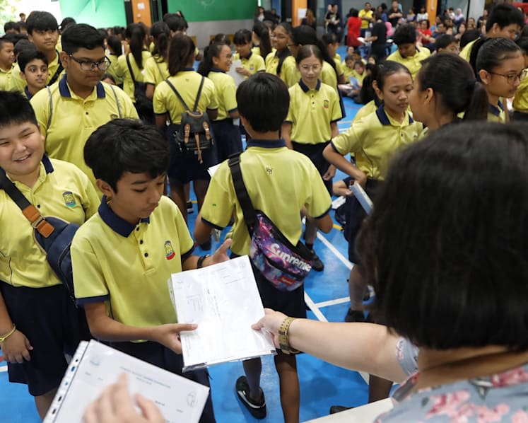 Withholding of results slips to be reviewed at all levels: Children shouldn't bear responsibility of arrears, says Ong