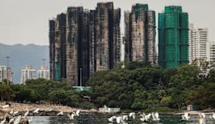 Hong Kong plans to buy homes devastated in deadly high-rise fire