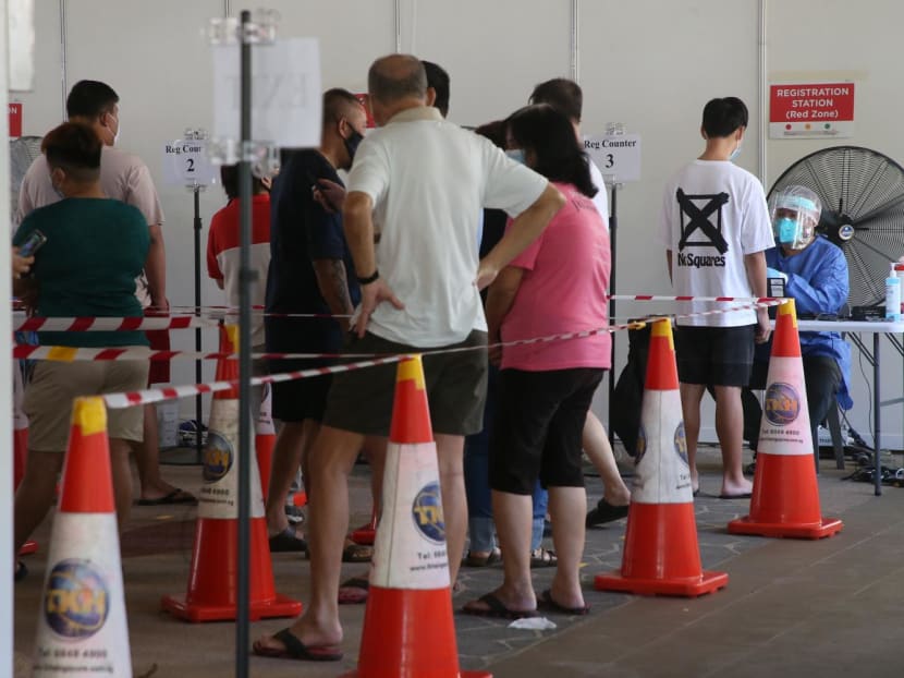 A Covid-19 testing exercise being conducted for all residents living at Blk 456 Ang Mo Kio Ave 10, as well as owners and staff members working at the commercial units there, on July 25, 2021. A Covid-19 testing exercise being conducted for all residents living at Blk 456 Ang Mo Kio Ave 10, as well as owners and staff members working at the commercial units there, on July 25, 2021.