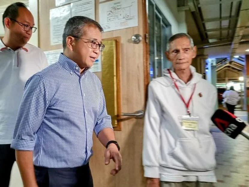 Minister for Culture, Community and Youth Edwin Tong (centre) steps out of a Meet-the-People session at Chai Chee on July 17, 2023. Minister for Culture, Community and Youth Edwin Tong (centre) steps out of a Meet-the-People session at Chai Chee on July 17, 2023.