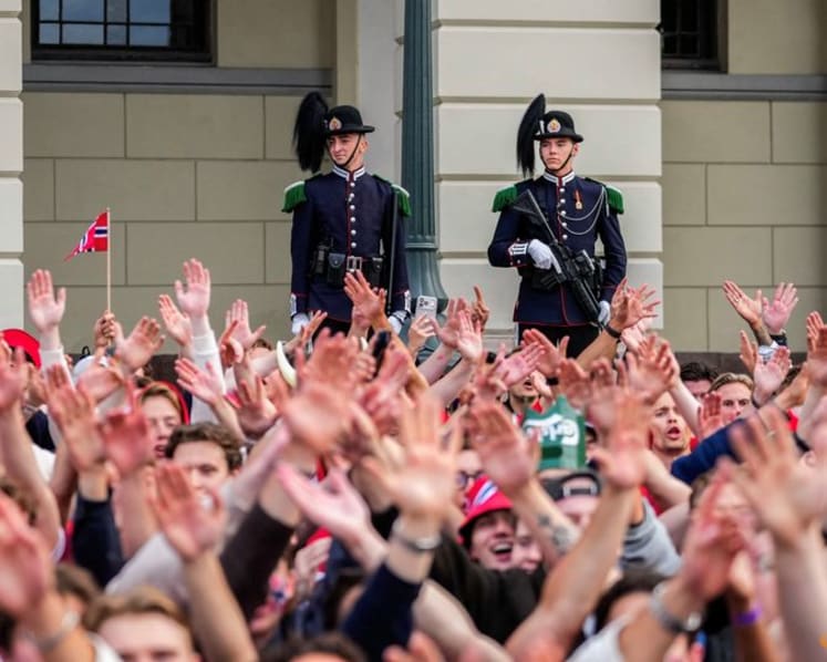 Norwegian fans take dawn World Cup party to palace gates to wake the King 