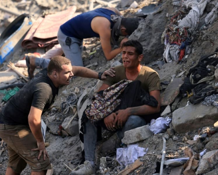 Famine and disease unless Gazans get more aid faster say UN chiefs