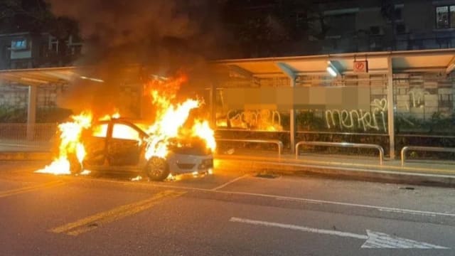 马国私召车司机疑不满政府 向辅警车抛汽油弹