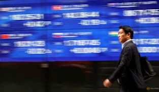 Asian markets fluctuate ahead of expected US rate cut