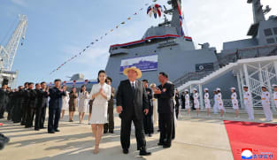 North Korea launches repaired destroyer, Kim vows two more to come