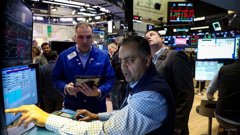 Stocks fall as investors mull AI disruptions, oil prices rise