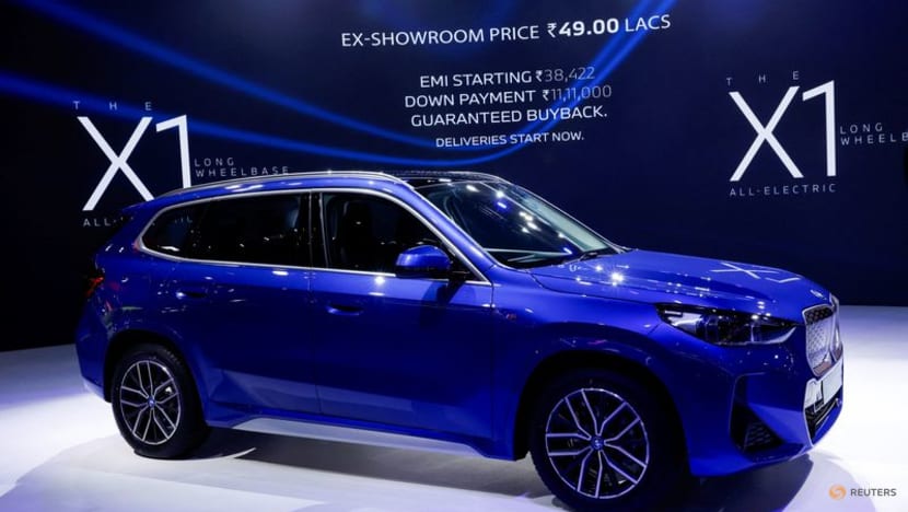 Carmakers at India auto show unveil charging network plans, new EVs Carmakers at India auto show unveil charging network plans, new EVs
