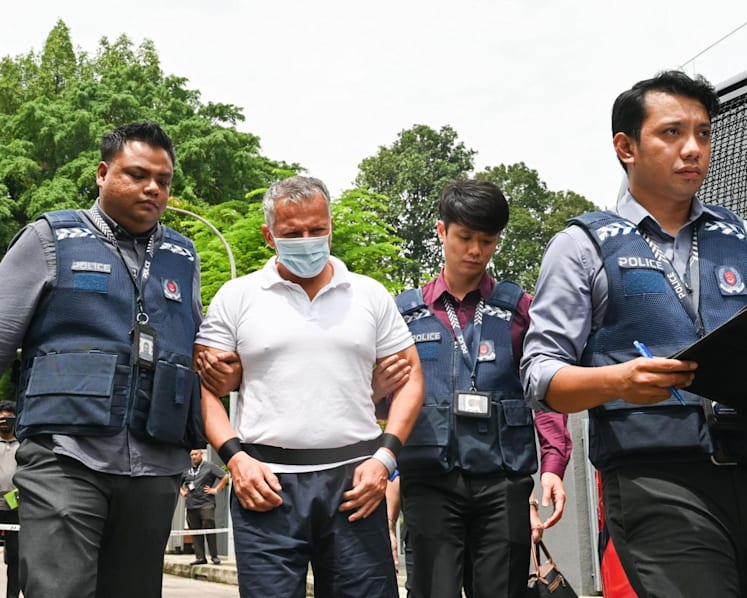 Two men accused of breaking into Bukit Timah home taken back to crime scene