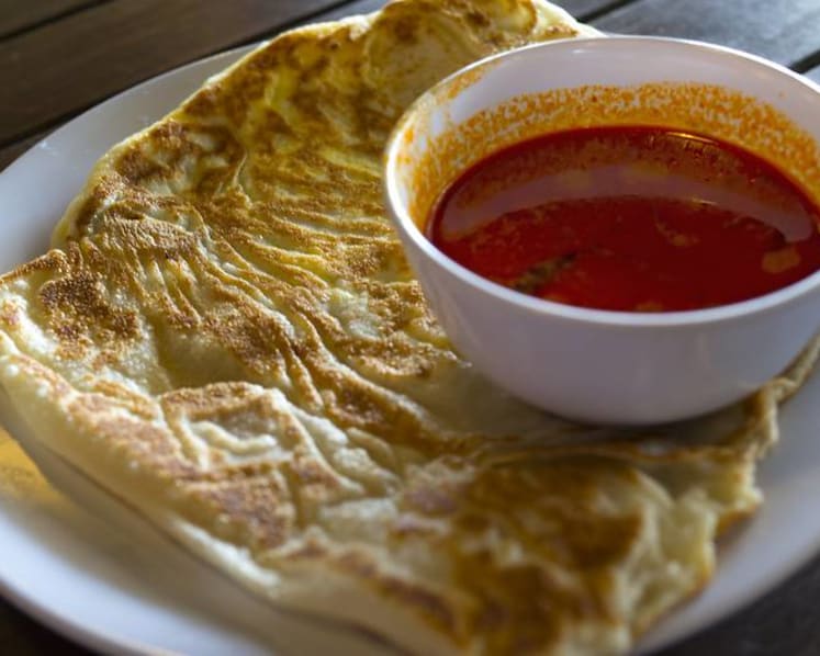 Man slashes cook after demanding free roti prata, gets jail and caning