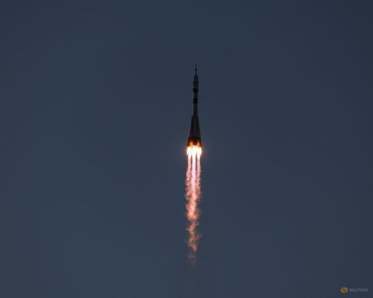 Russia sends American and two cosmonauts to space station with rare NASA chief visit