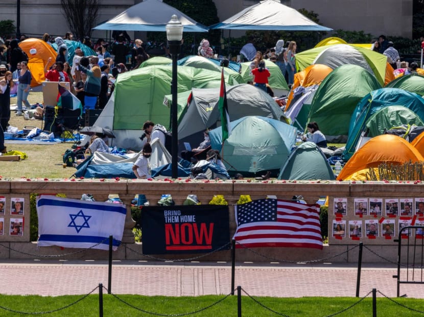 Posters and flags honoring Israeli hostages kidnapped on Oct 7 are displayed on a ledge near the pro-Palestine encampment at Columbia University on April 24, 2024 in New York City. 