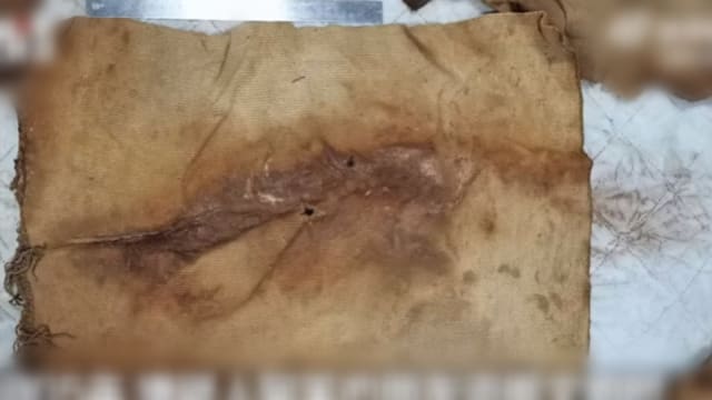 赌债缠身倒卖千年裹尸布 中国男子落网揭文物盗卖案