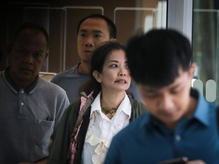 Lee Hui Yin (in white) at the State Courts on June 26, 2023. Lee, 53, is now known as Tarchandi Tan after changing her name in 2022.