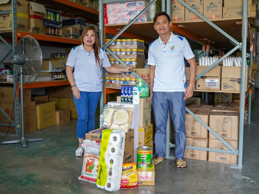 Kindness Mart director Bibi Wong and founder Steven Goh at their warehouse.