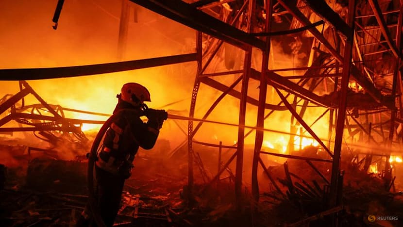 Russian missiles strike Kyiv districts, killing two, officials say