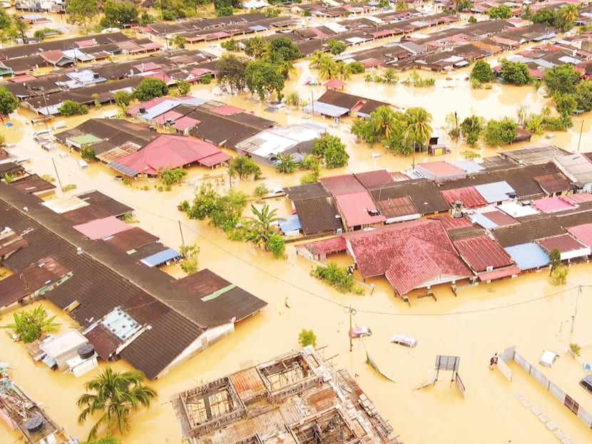 An aerial view shows a flooded residential area after torrential rains, in this screen grab taken from a drone footage in Hulu Langat district, Selangor state, Malaysia on Dec 19, 2021. An aerial view shows a flooded residential area after torrential rains, in this screen grab taken from a drone footage in Hulu Langat district, Selangor state, Malaysia on Dec 19, 2021.