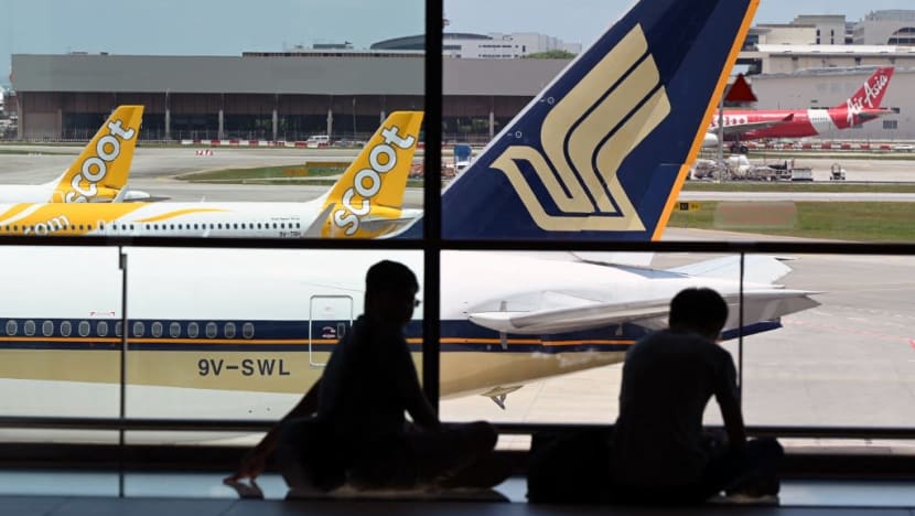 Explainer: Do you need to wear a mask when travelling by plane, and what are the rules in other countries?