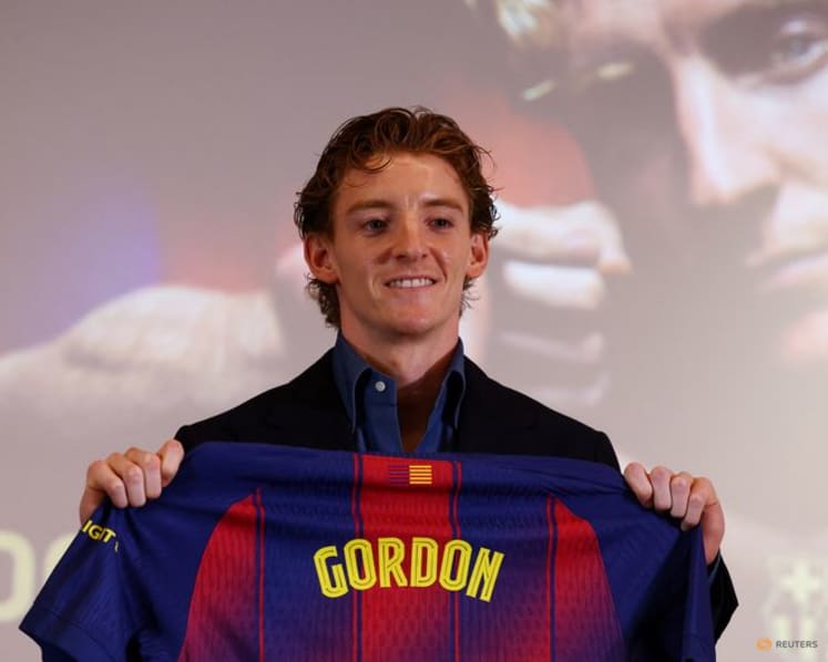 Barcelona sign England winger Gordon from Newcastle