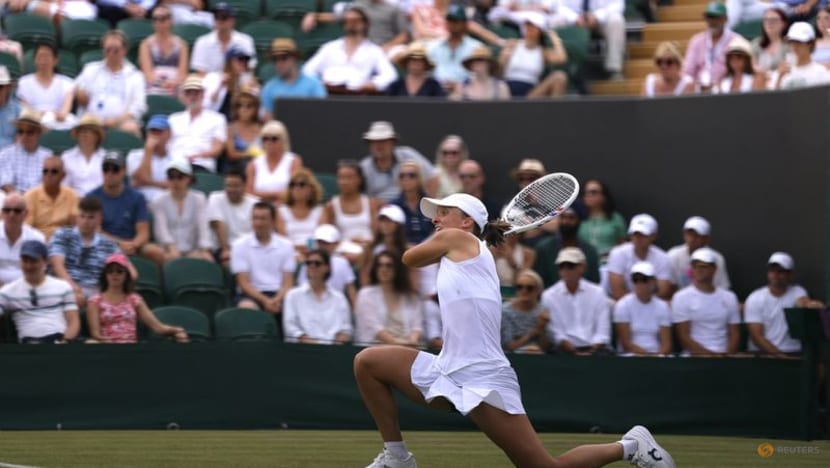 Feeling hot, hot, hot - Swiatek downs Wimbledon debutant to reach round two Feeling hot, hot, hot - Swiatek downs Wimbledon debutant to reach round two