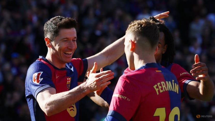 Lewandowski strikes twice as Barcelona beat Girona to take LaLiga lead