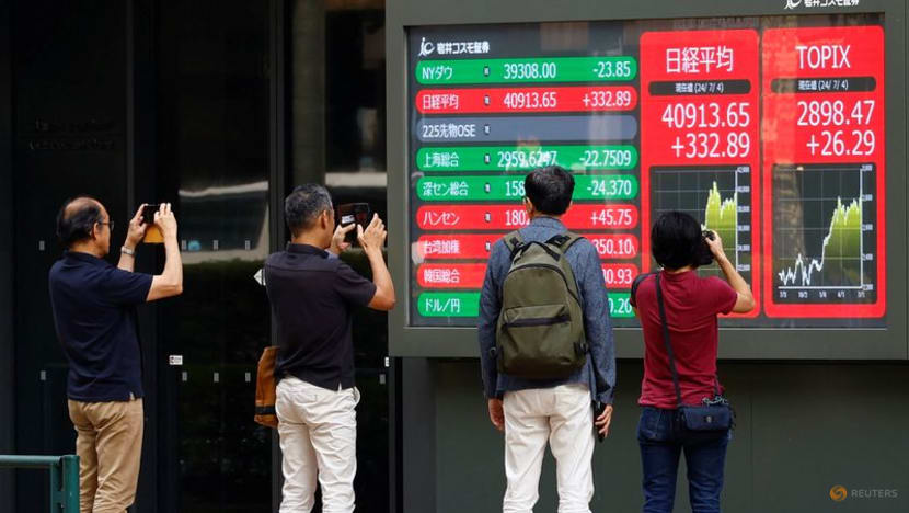 Japan's Topix tops 3,000 for first time on tariff clarity; SoftBank soars