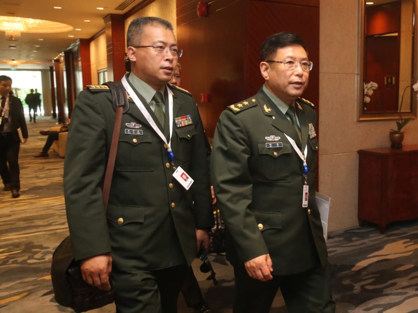 Lieutenant-General He Lei (right), who attended the Shangri-La Dialogue (SLD) in Singapore on Saturday (June 3). Photo: Ooi Boon Keong/TODAY Lieutenant-General He Lei (right), who attended the Shangri-La Dialogue (SLD) in Singapore on Saturday (June 3). Photo: Ooi Boon Keong/TODAY