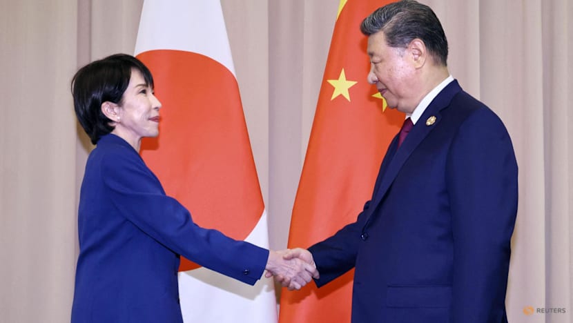 Japan PM says raised 'serious concerns' with Xi on South China Sea, Xinjiang