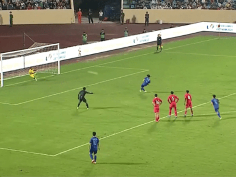 Thailand scoring one of their five goals against Singapore.