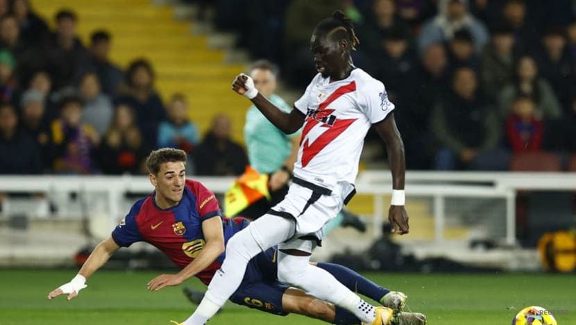 Barcelona edge Rayo to claim top spot with Lewandowski penalty Barcelona edge Rayo to claim top spot with Lewandowski penalty