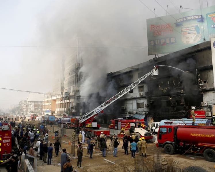 Dozens missing after massive Karachi mall fire, 19 killed
