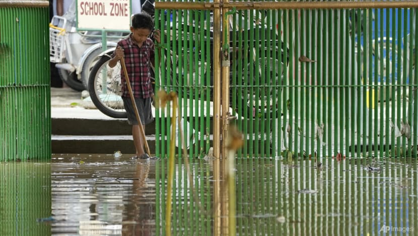 'We have to do something': Philippine schools, students grapple with floods as climate change forces them to adapt
