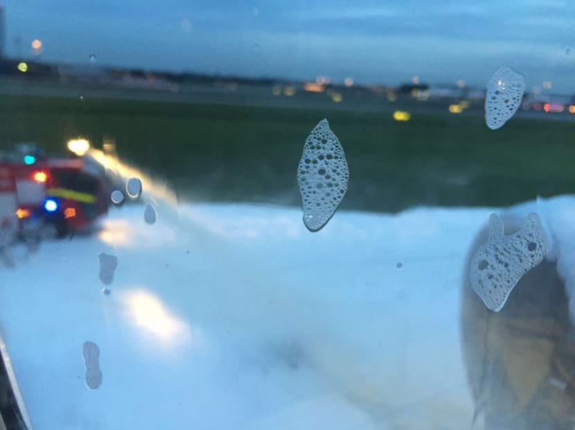 SIA jet makes emergency return to Changi, bursts into flames on runway