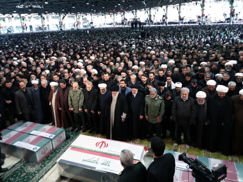 Iran's Supreme Leader Ayatollah Ali Khamenei and Iranian President Hassan Rouhani among those who prayed near the coffin of Iranian Major-General Qassem Soleimani in Tehran, Iran, Jan 6. Iran's Supreme Leader Ayatollah Ali Khamenei and Iranian President Hassan Rouhani among those who prayed near the coffin of Iranian Major-General Qassem Soleimani in Tehran, Iran, Jan 6.