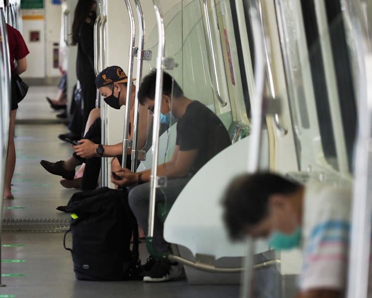 Singapore commuters keep masks on despite discarded Covid-19 public transport rule