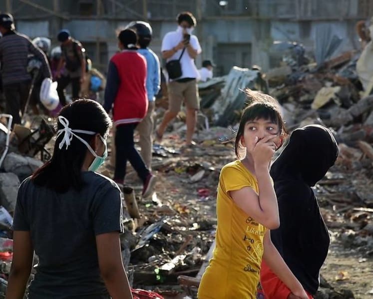 Despair fills Indonesia's buried village of Petobo as search for bodies draws to an end