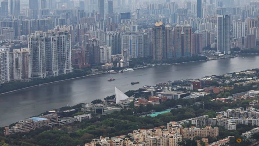 China property shares jump as major cities ease buying curbs China property shares jump as major cities ease buying curbs