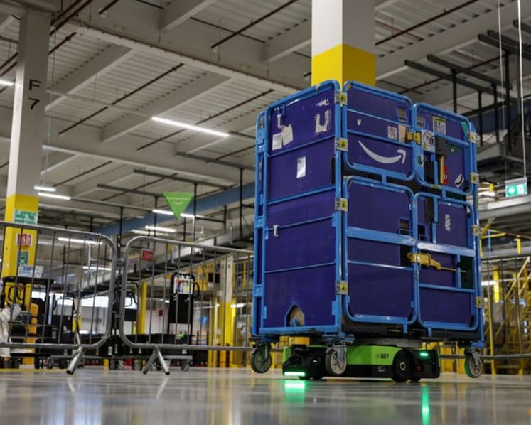 Amazon unveils new AI warehouse robot in $12 billion Europe push