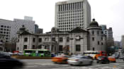Bank of Korea to lower interest rates cautiously, minutes show