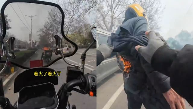 见骑手电动车起火 山东送餐员喊停英勇上前灭火