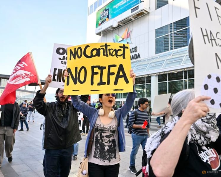 Advocates for homeless, hotel workers rally outside FIFA Congress in Vancouver