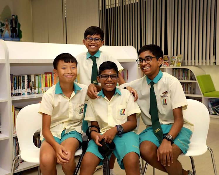 Student with cerebral palsy collects PSLE results after beating fear of school with a little help from friends