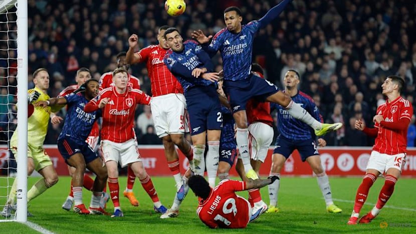 Arsenal frustrated by feisty Forest but move seven points clear at top