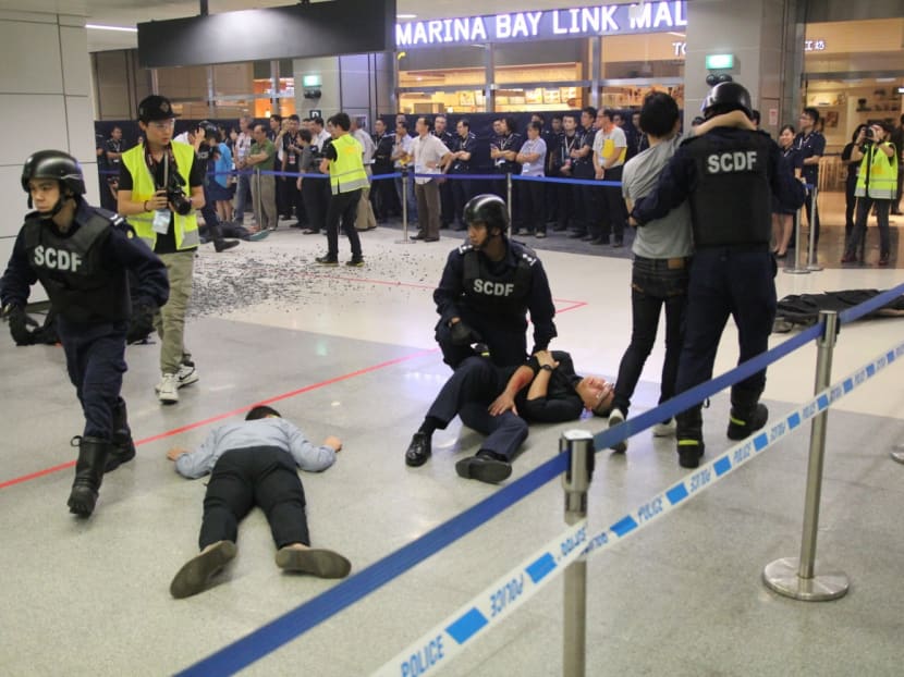 Police conduct anti-terror exercises at Dhoby Ghaut, Downtown MRT stations