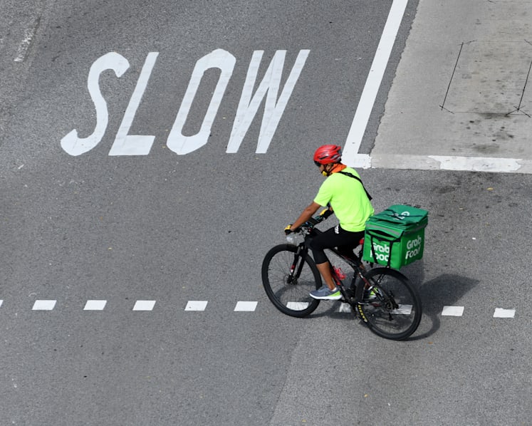 Some food delivery workers see earnings dip as Covid-19 rules ease; Foodpanda and Deliveroo confident of sustained demand