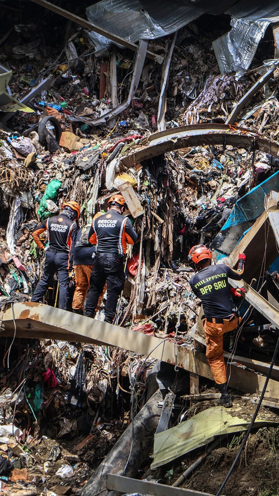 Hopes wane for survivors in Philippine garbage site collapse