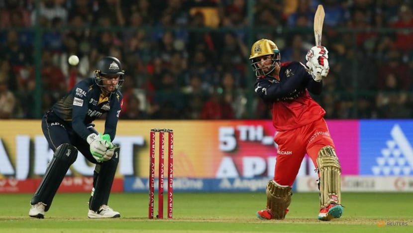 Siraj, Buttler guide Gujarat to easy IPL win over Bengaluru Siraj, Buttler guide Gujarat to easy IPL win over Bengaluru