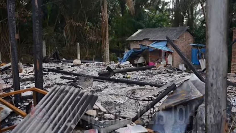  2 Malaysian brothers charged with murder after 6 bodies found in burnt Johor house