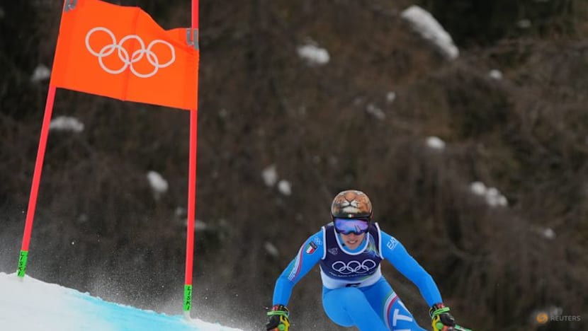 Alpine skiing-Fearless Brignone takes super-G gold in epic comeback win