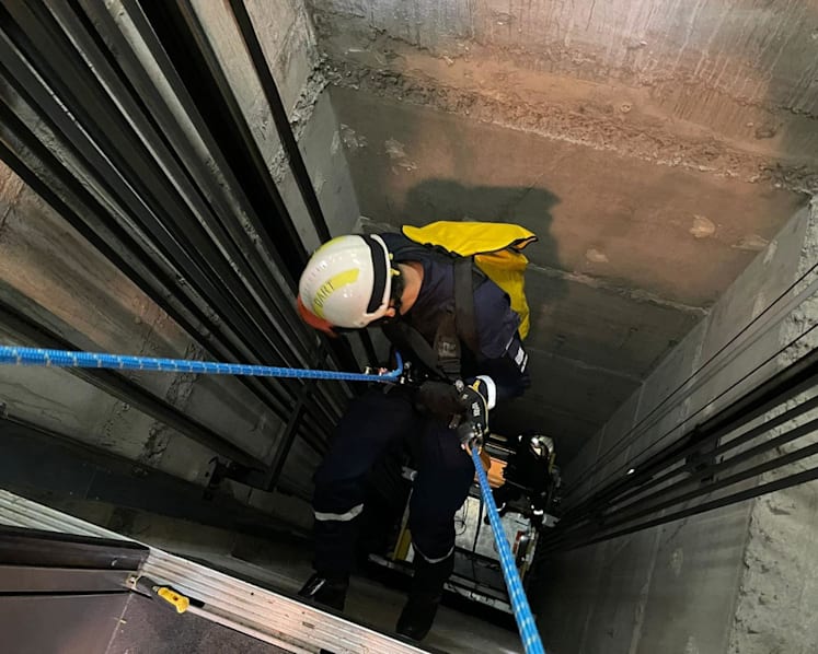 Three people rescued after getting trapped in lift