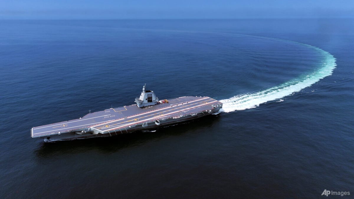 Taiwan says Chinese aircraft carrier sailed through Taiwan Strait